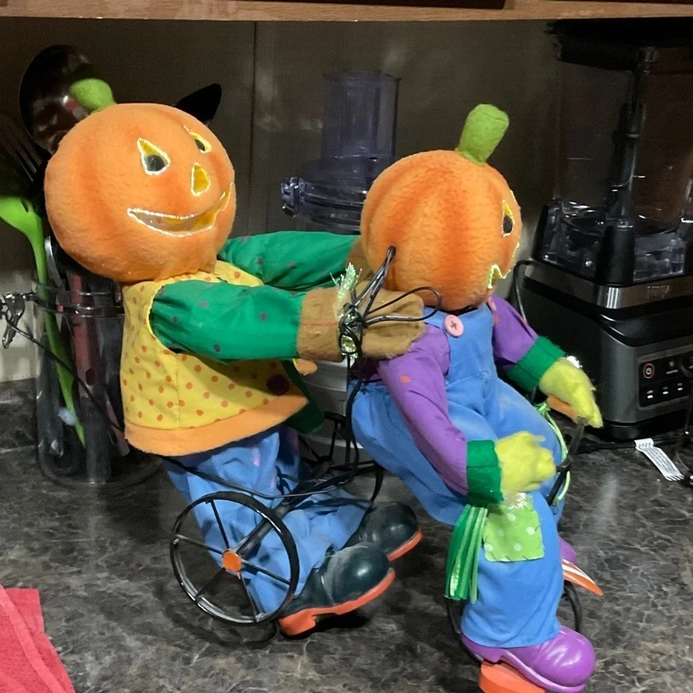 Festive Pumpkin Head Decor with Blue Overalls